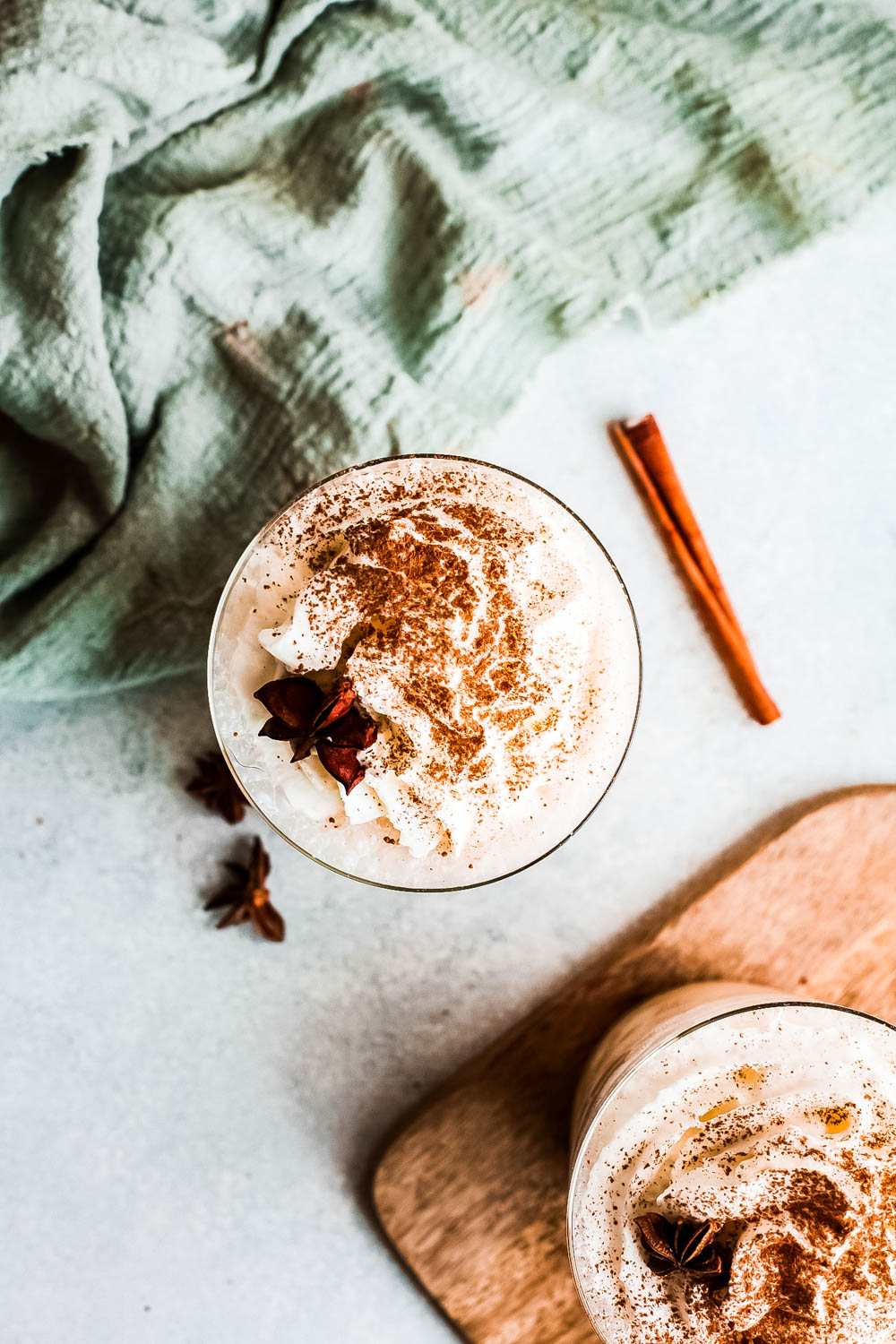 overhead view of Eggnog Frappuccino in cup topped with ground cinnamon.