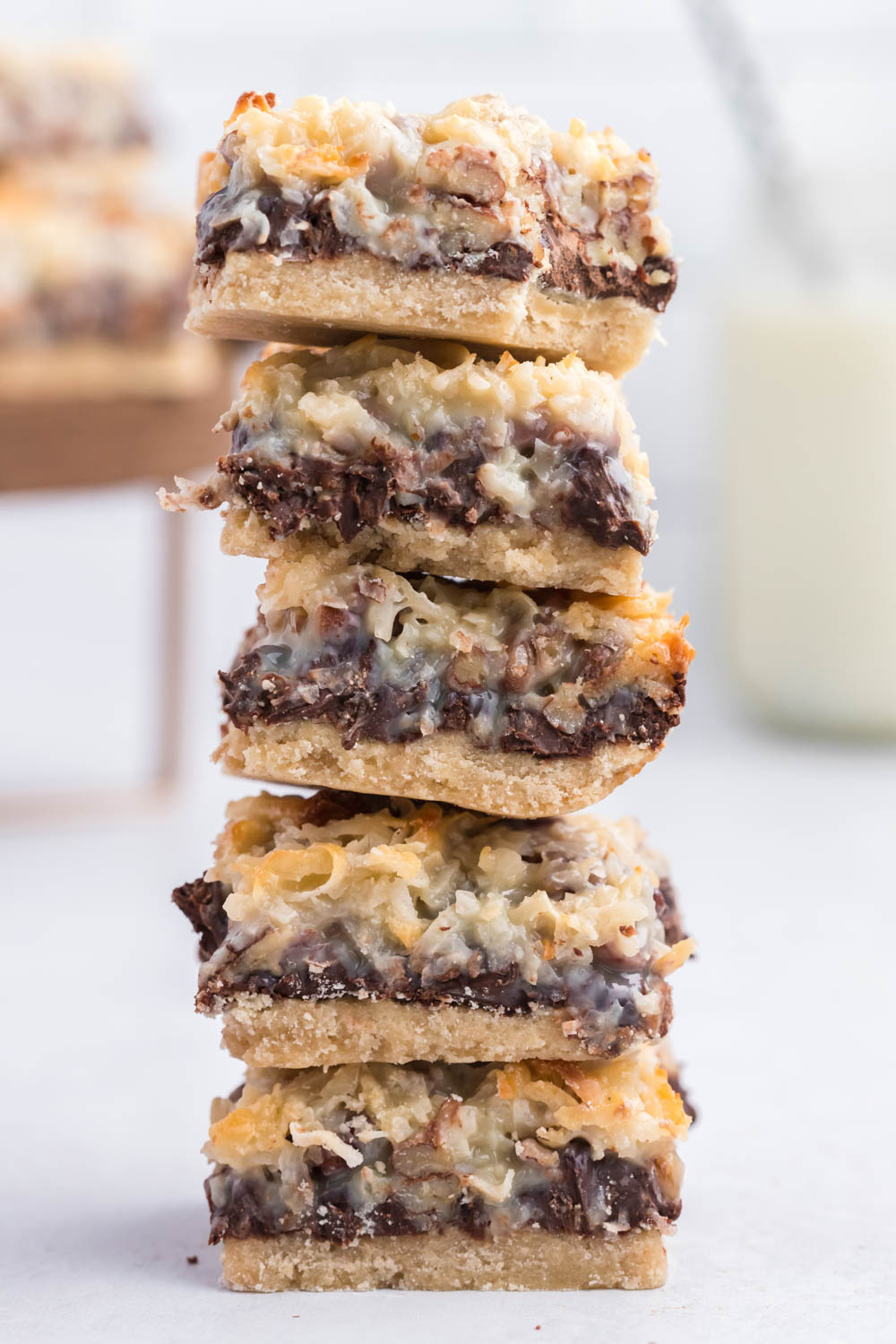 classic seven layer magic bars stacked on top of each other.