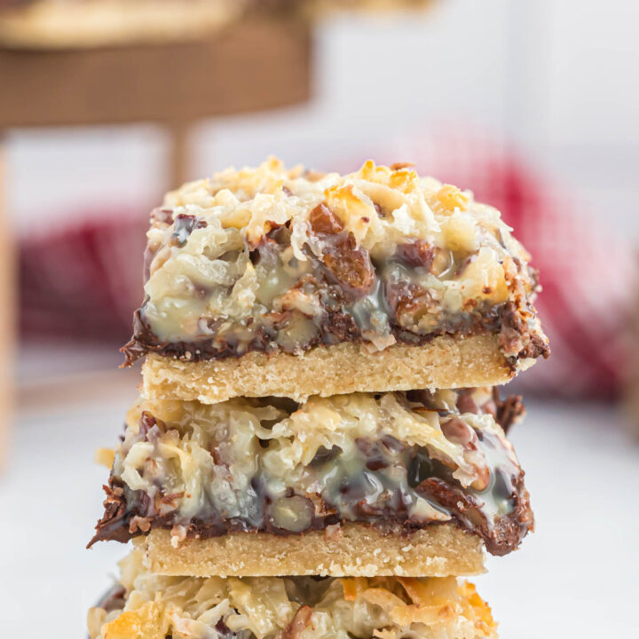 close up of Seven Layer Magic Bars stacked.