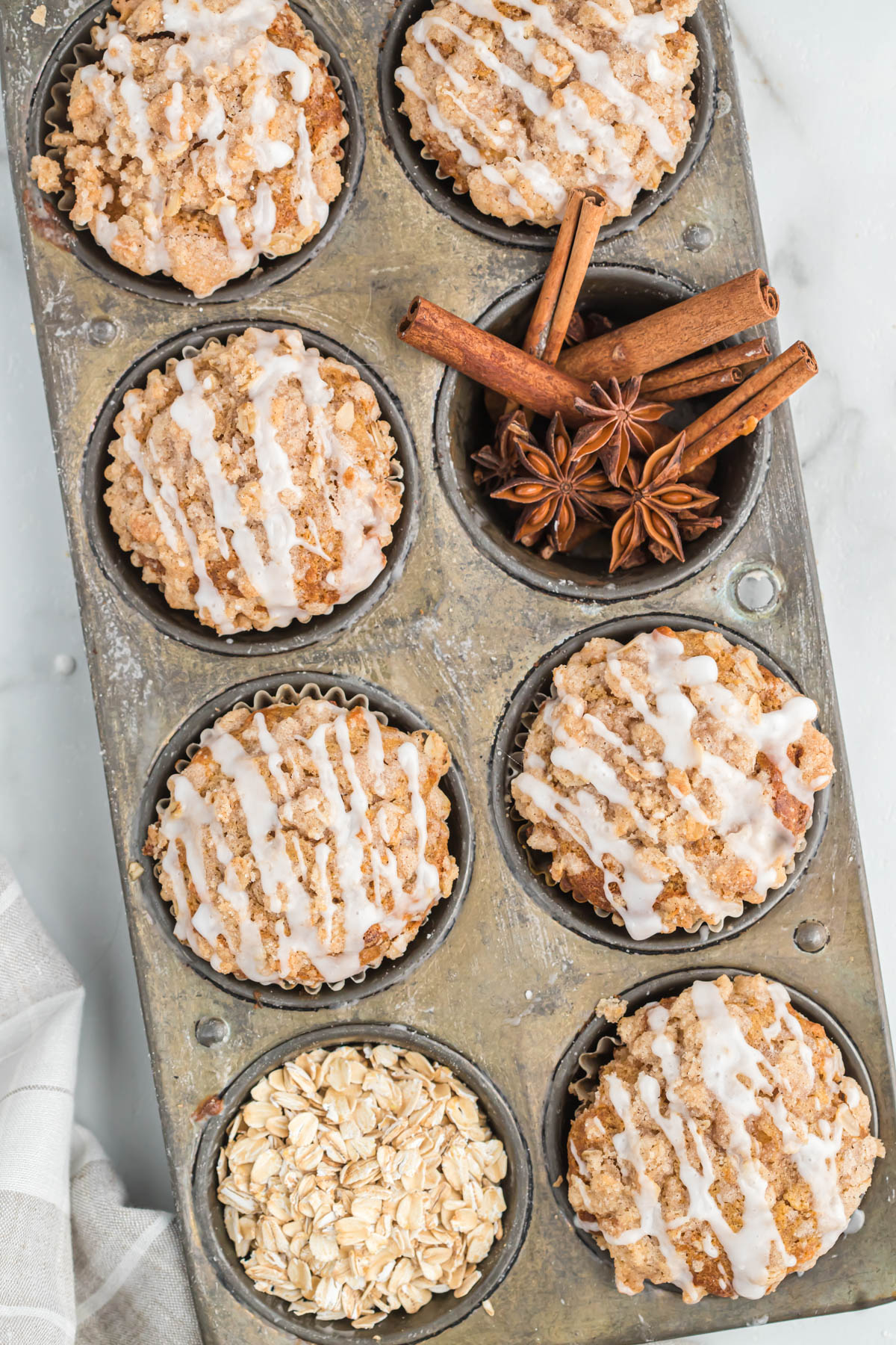 apple oatmeal muffins in muffin tins