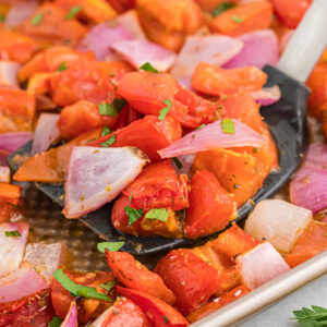 roasted tomatoes on spatula