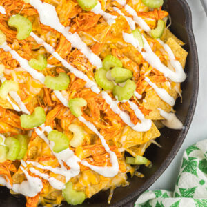 buffalo chicken skillet nachos in pan