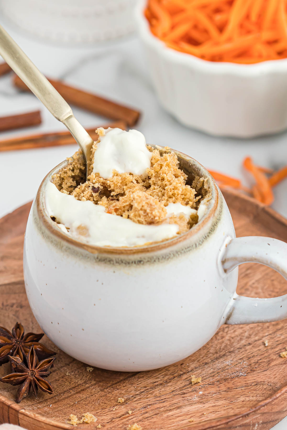 carrot mug cake in white cup