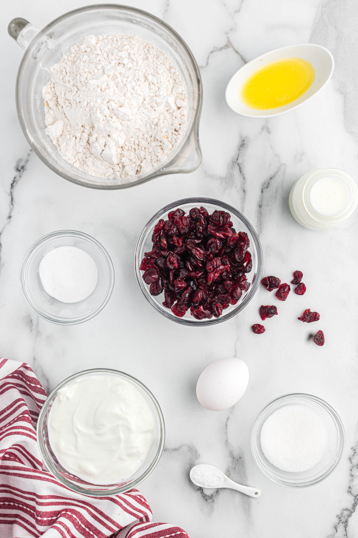 ingredients in glass bowls for cranberry soda bread