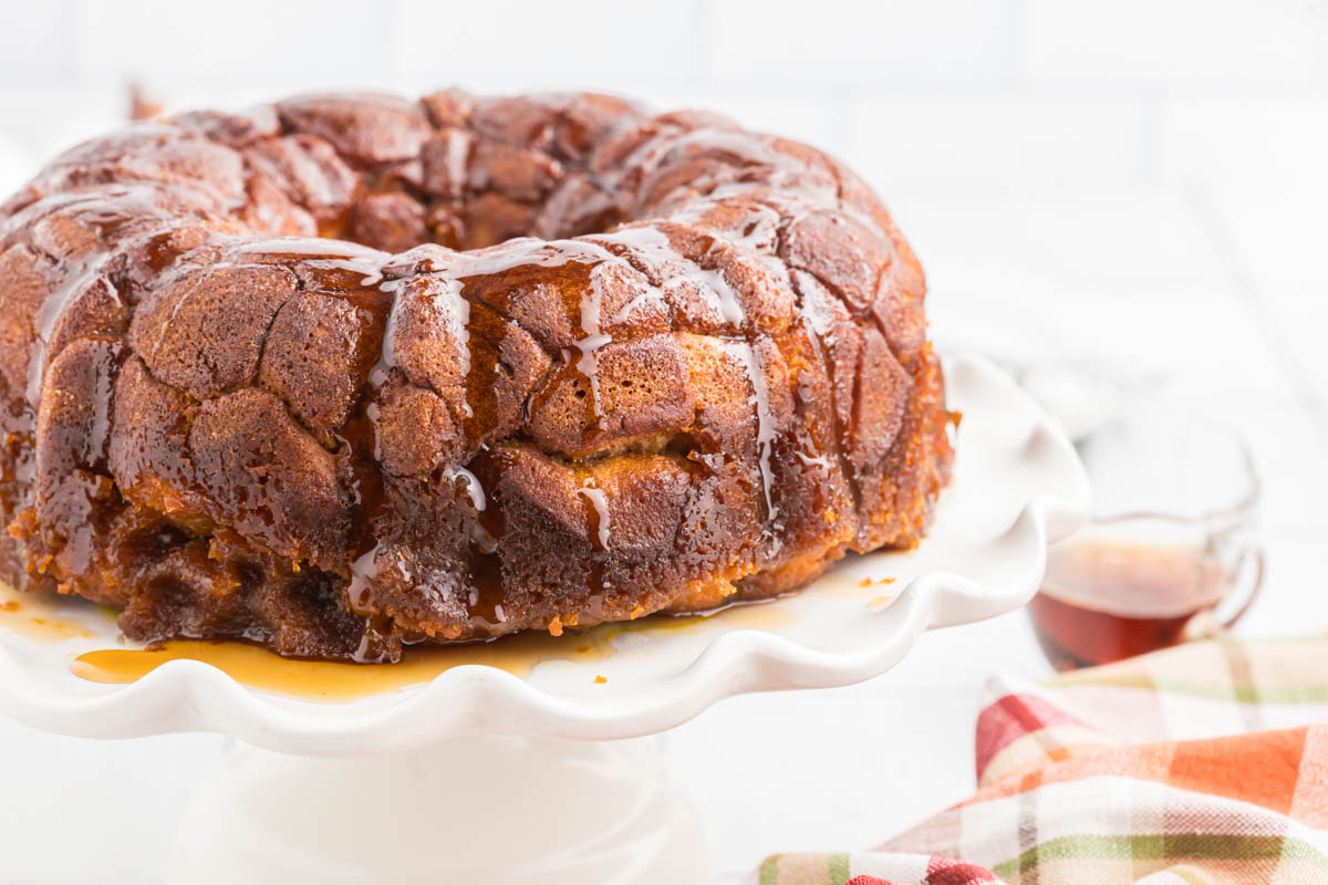 Maple Pumpkin Monkey Bread on white cake plate