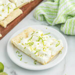 Key lime tarts on white plate.